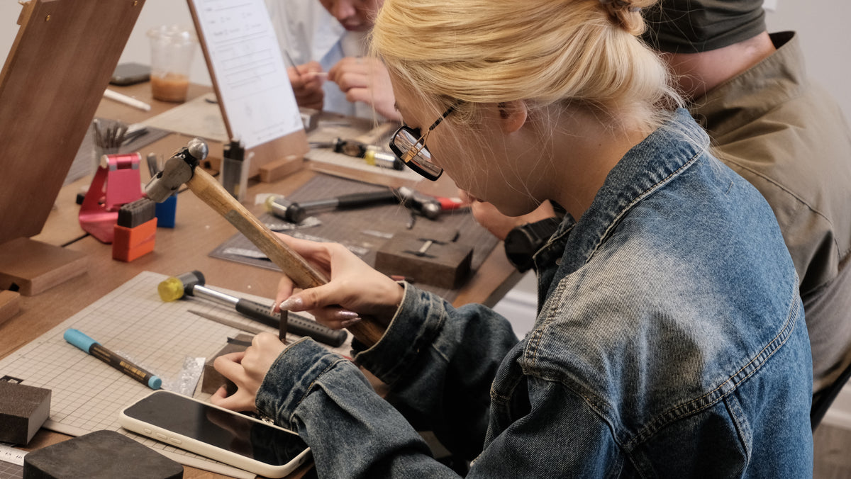 Guests making rings with guidance at Silvan