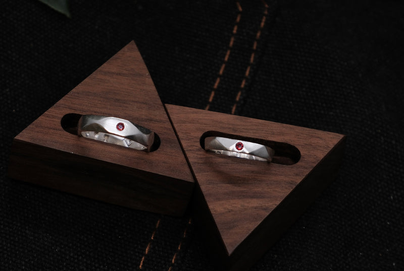Silver rings with red stone details